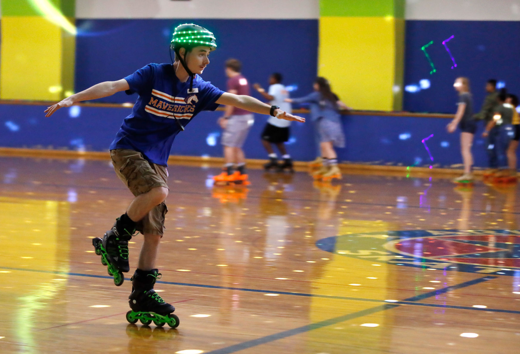 UTA, TCC students mingle at Baptist Student Ministry's Retro Skate Social